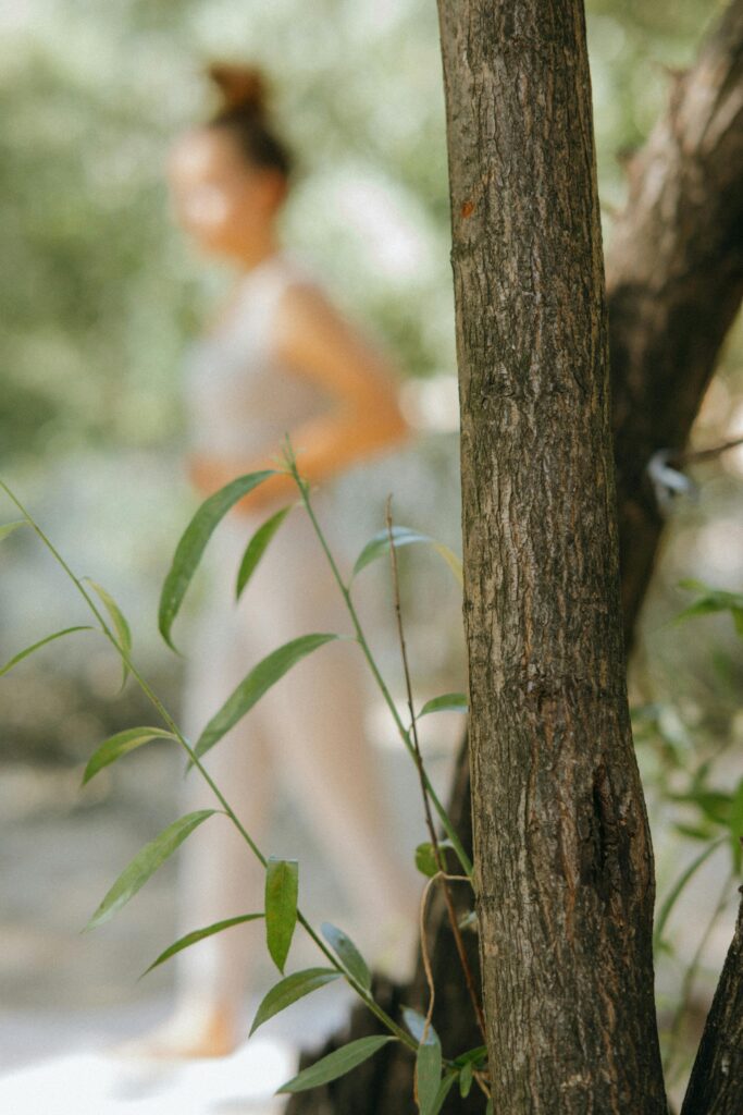 pexels photo 8534447 8534447 A woman practicing yoga outdoors, blending serenity and nature.